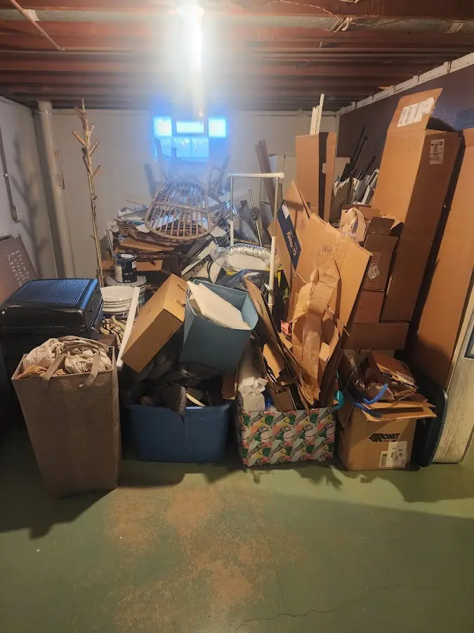 Roll-off dumpster container at job site for 4 Yard Dumpster Rental in East Hills